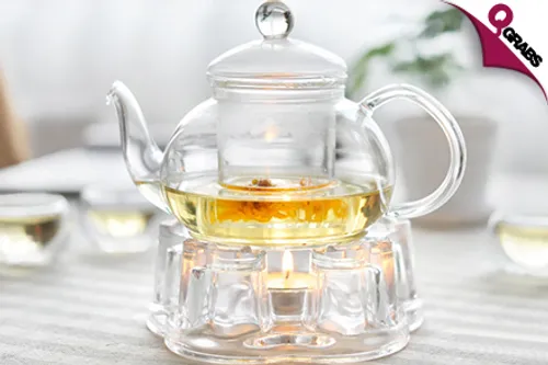 From QR89 Drink Up with an Elegant Glass Tea Set - Includes Teapot, Teacups & Teapot Warmer! (Up to QR298 Value)